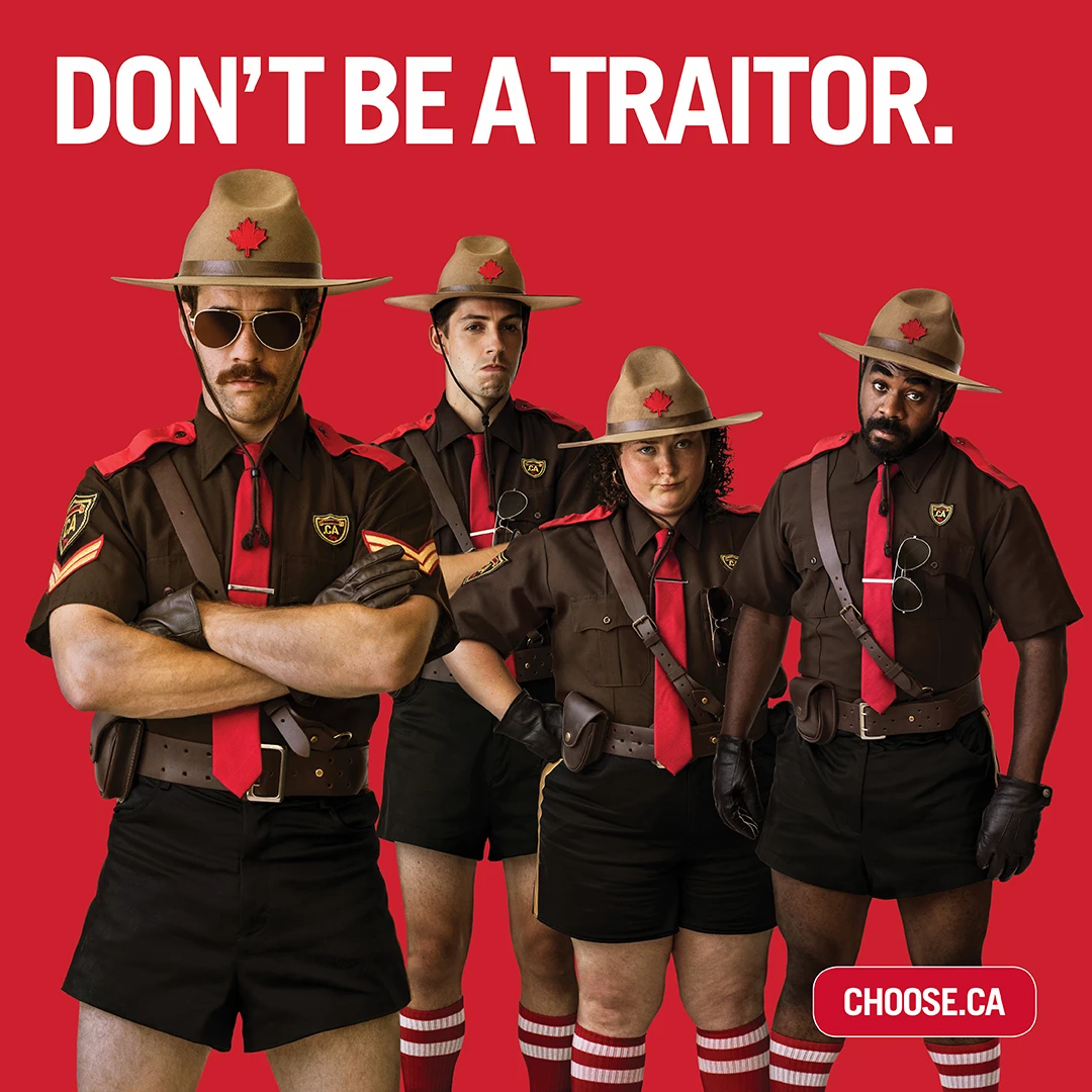 The four members of the ’Eh Team beneath “Don’t be a traitor” and above “Choose .CA”.