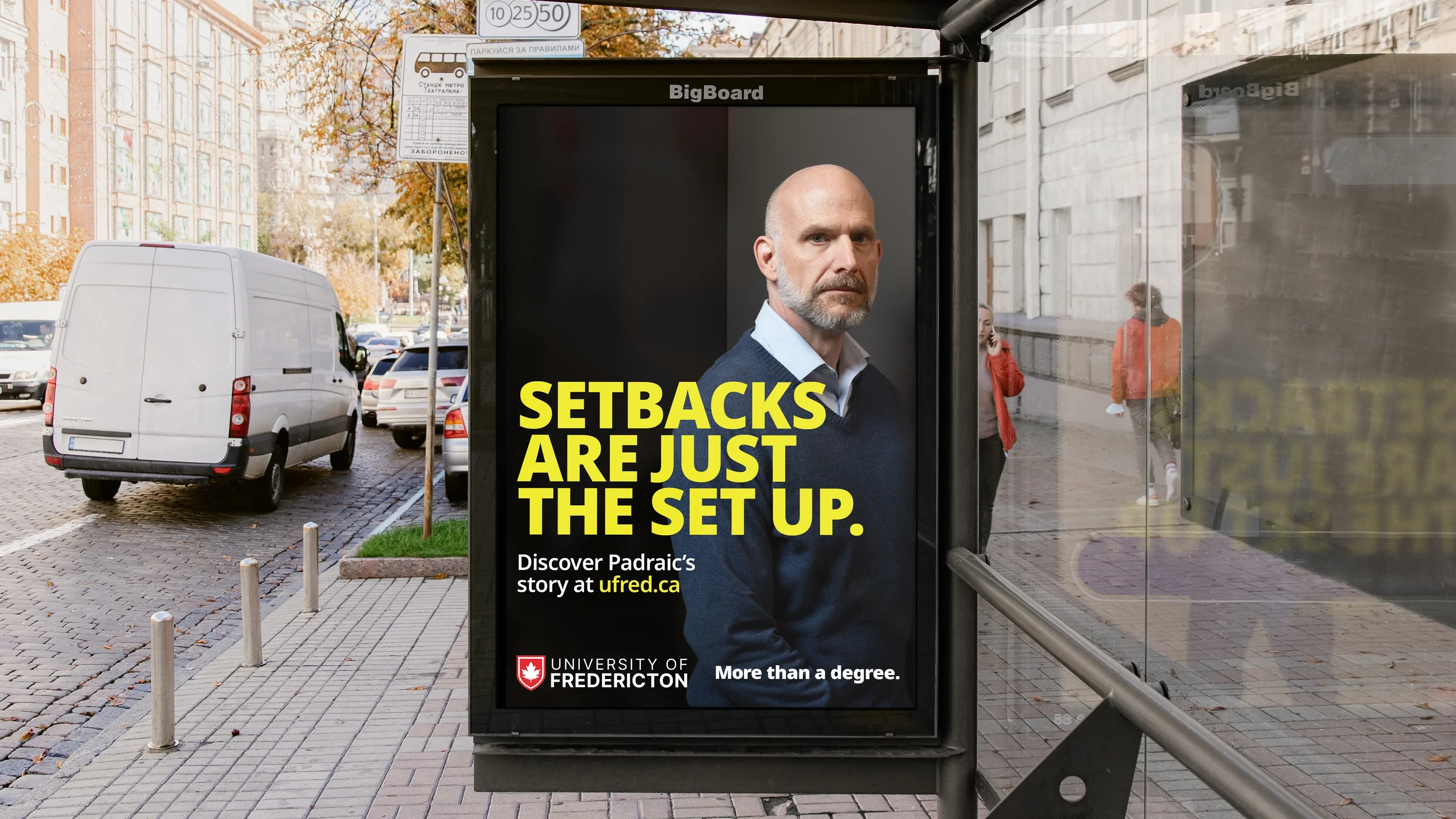 UFred “Setbacks are just the set up” campaign on a transit shelter featuring Padraic